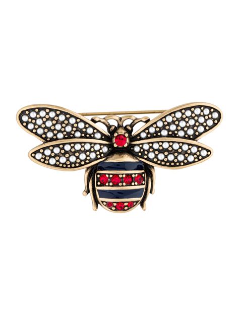 gucci bee pin.